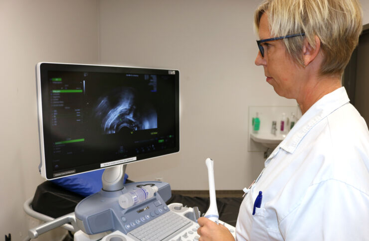 Female physician in a clinic surrounding.