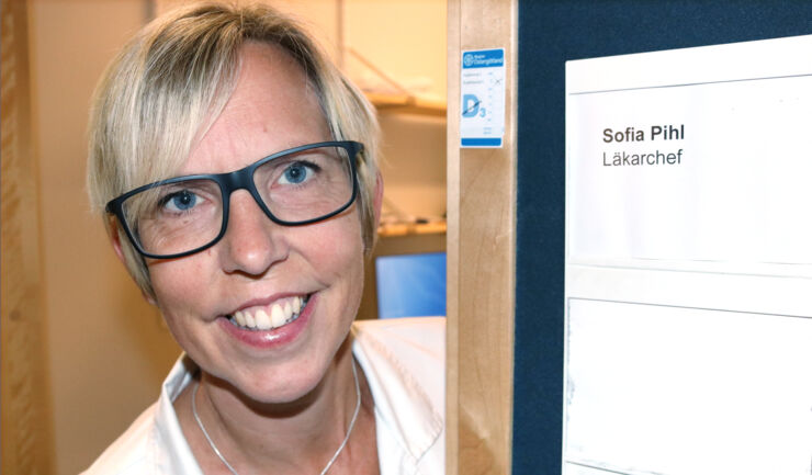 Female physician in a clinic surrounding.