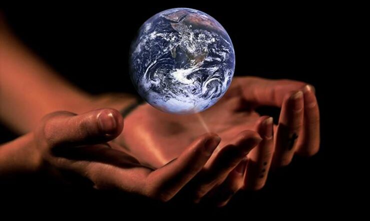 Hands holding the globe