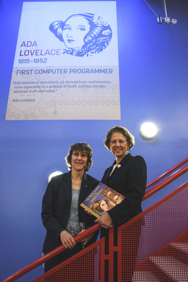 Inger Erlander Klein och Mariam Kamkar framför poster med Ada Lovelace