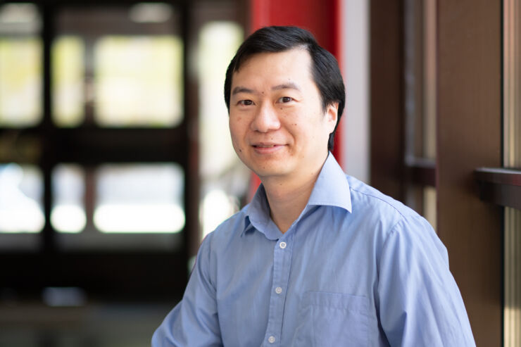  A man in blue shirt sitting down