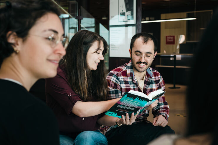 Students reading in a book