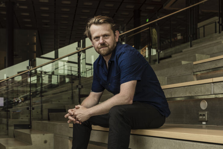 Harald Wiltsche sitting on the stairs of Studenthuset