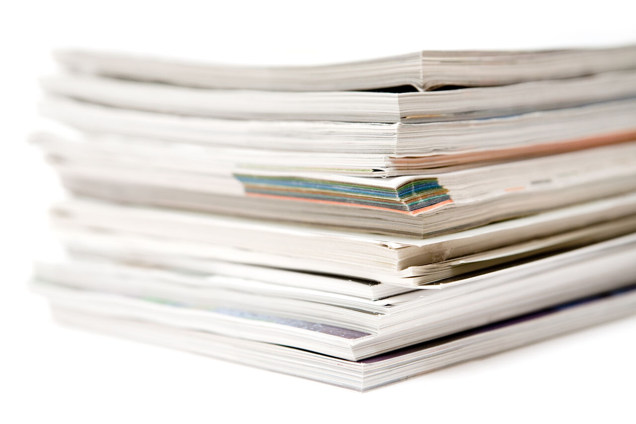 A pile of papers and magazines.