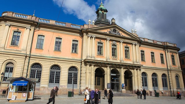 Stockholm, Sweden - April 16, 2010: Unidentified people walking in front of the building of the Royal Swedish Academy of Sciences in Stockholm, Sweden.