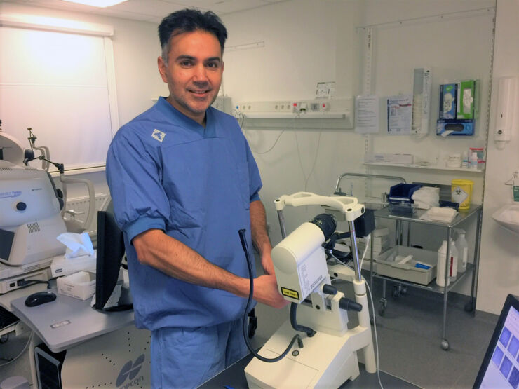Neil Lagali with equipment used for clinical examination.