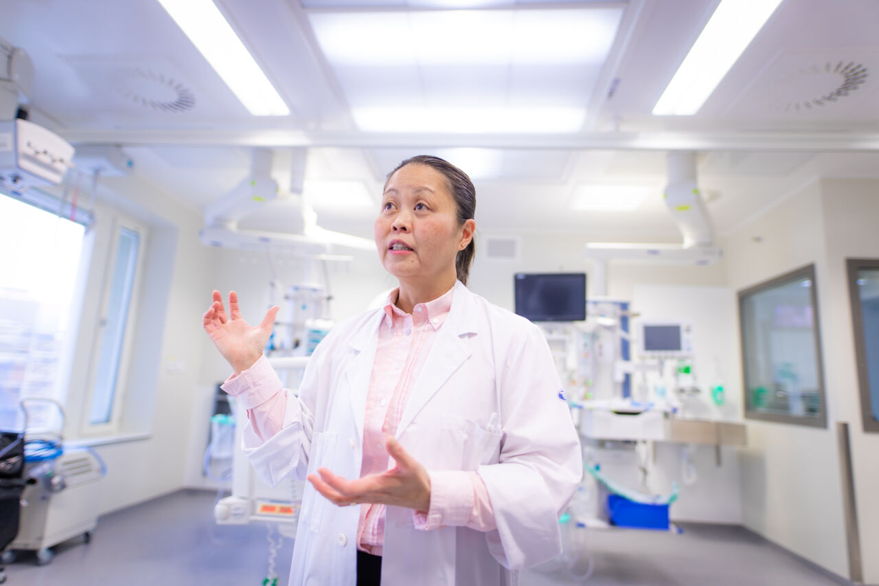 Female scientist in hospital environment.