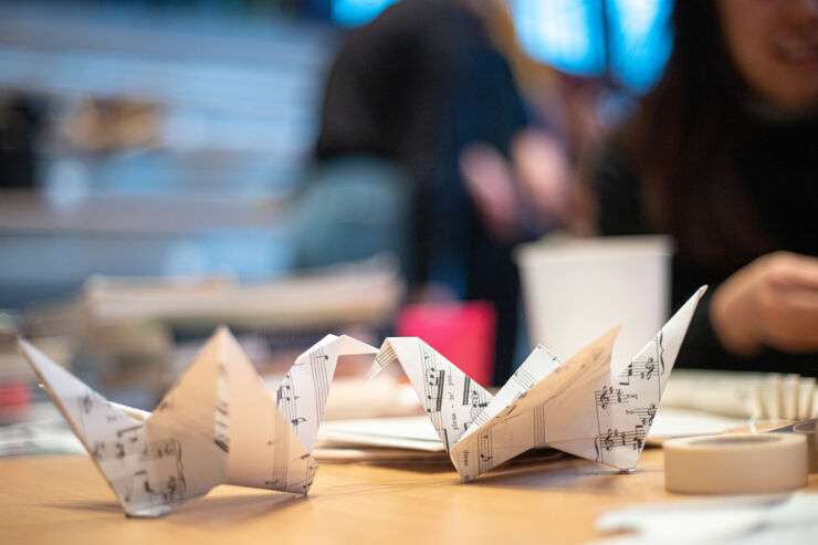 Paper birds made from old books