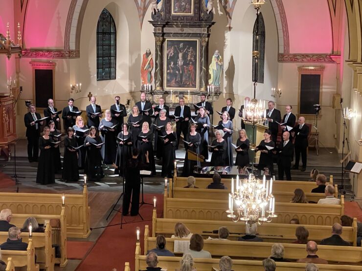 The choir sings in a church