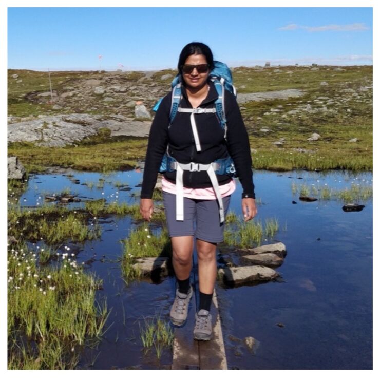 Picture of Vanessa Esperance Rodrigues outside and hiking.