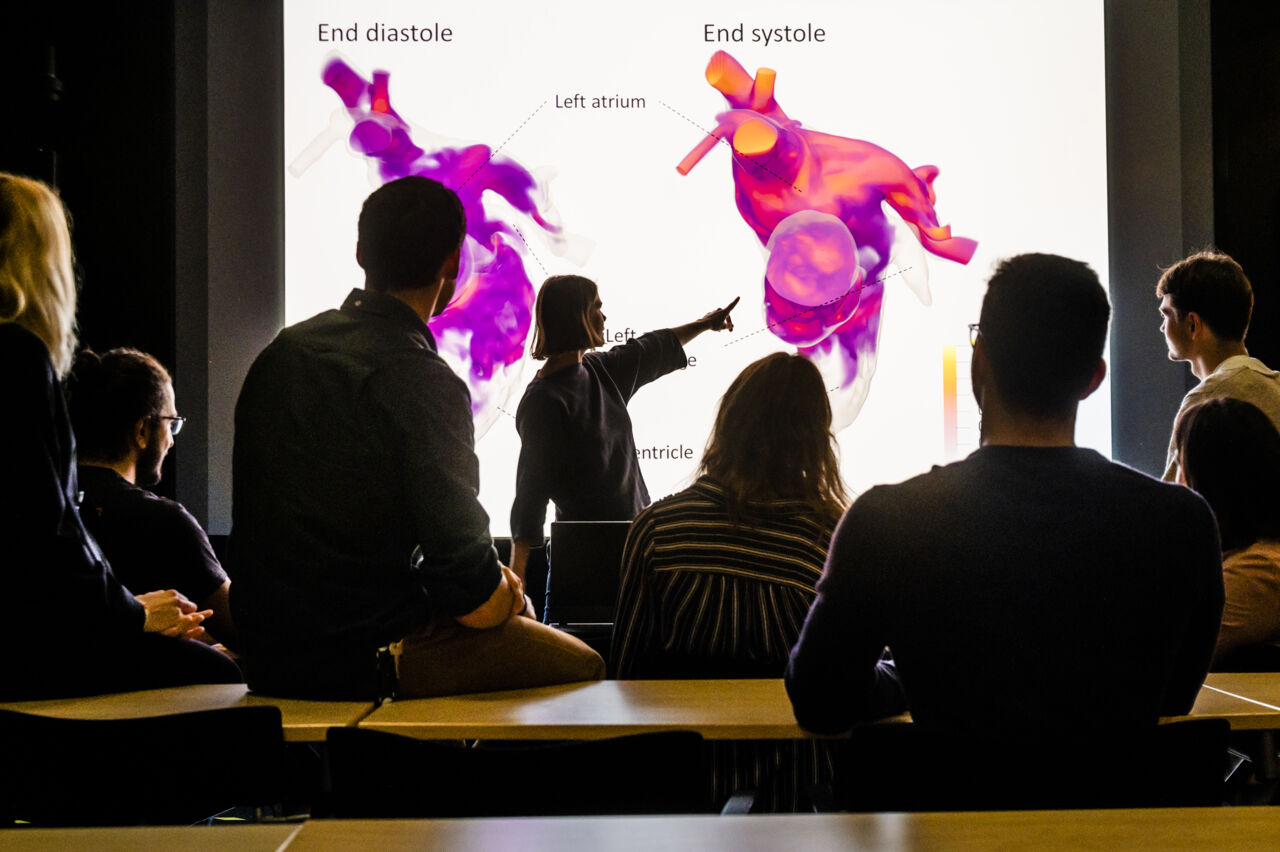 Group of PhD students in the lecture hall