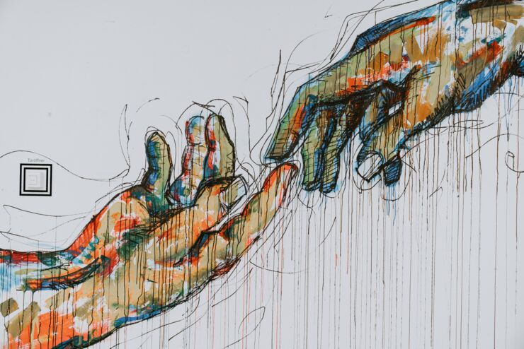 Interpretation of Michelangelo's The Creation of Adam. Two hands in different colours meet.