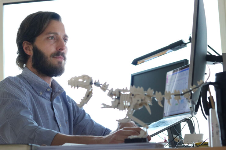Male researcher in university surrounding.