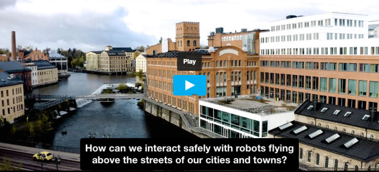 Image of Campus Norrköping from above, image before playing the video