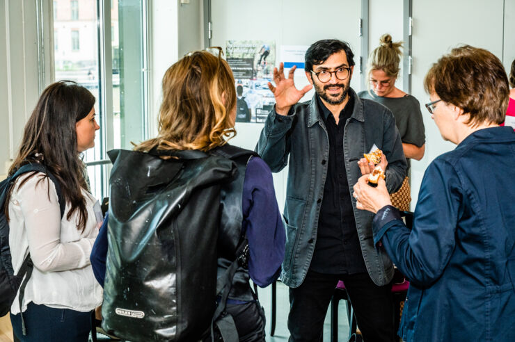 Modan Akbarnazim talks to participants at the festival. 