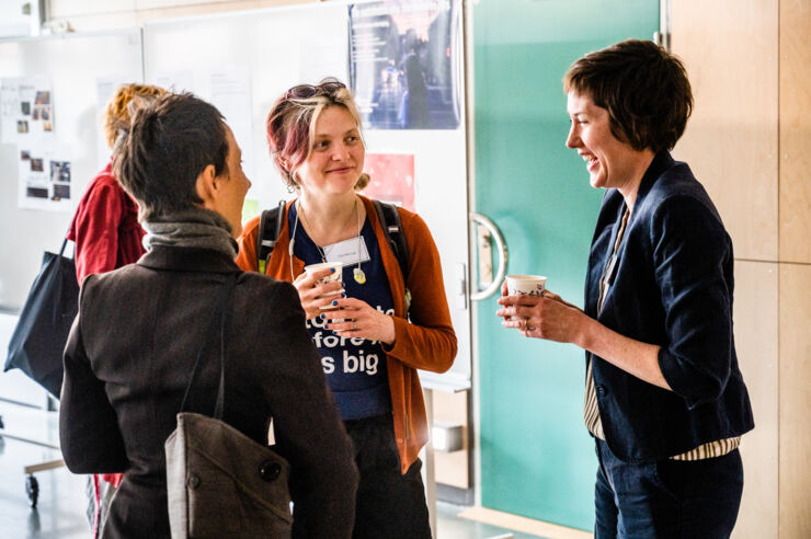 Katherine Harrison laughs together with participants.