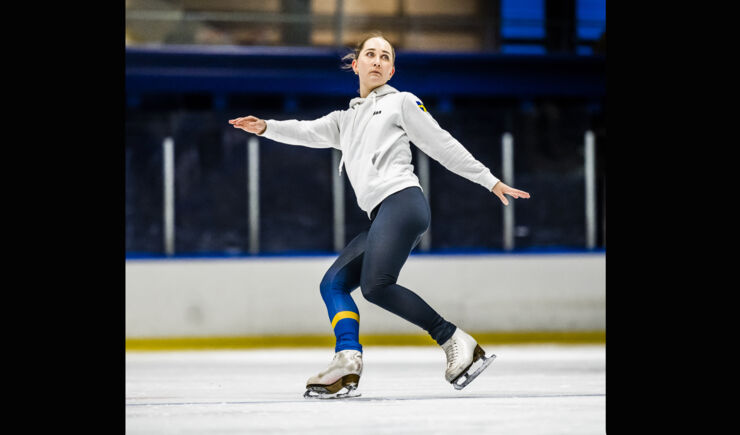 Female figure skater on the ice.