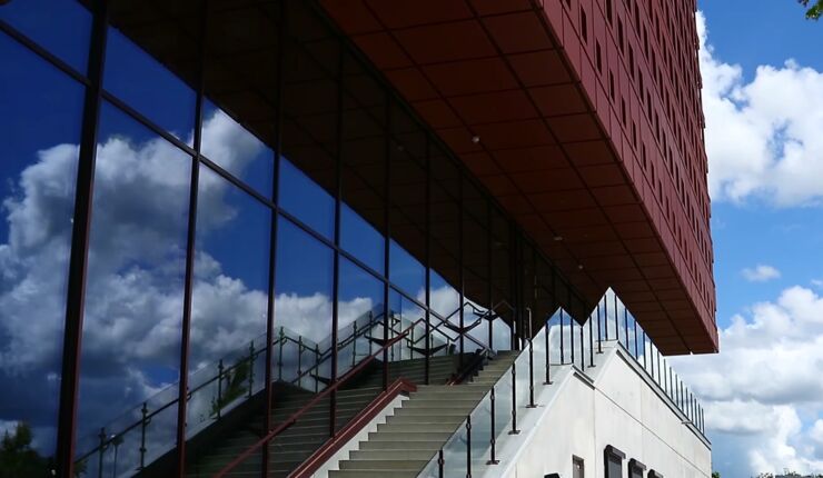 Parts of the facade of a building with stairs.