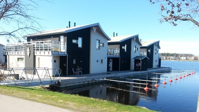  Houses built on pontoons in a lake.