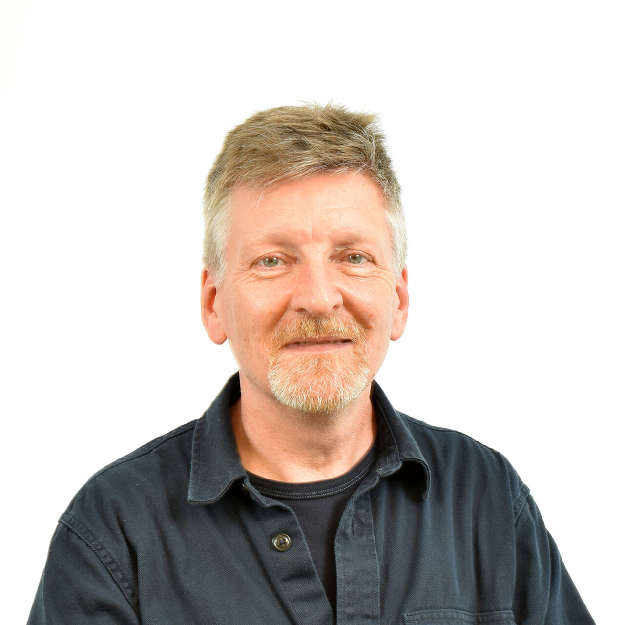 Mark Elam smiles at the camera.