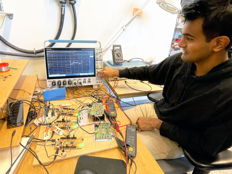 Arvind Balachandran, PhD Student at the Division of Vehicular Systems reads a oscilloscope.