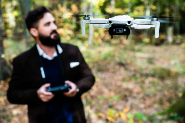 Man flying a drone.