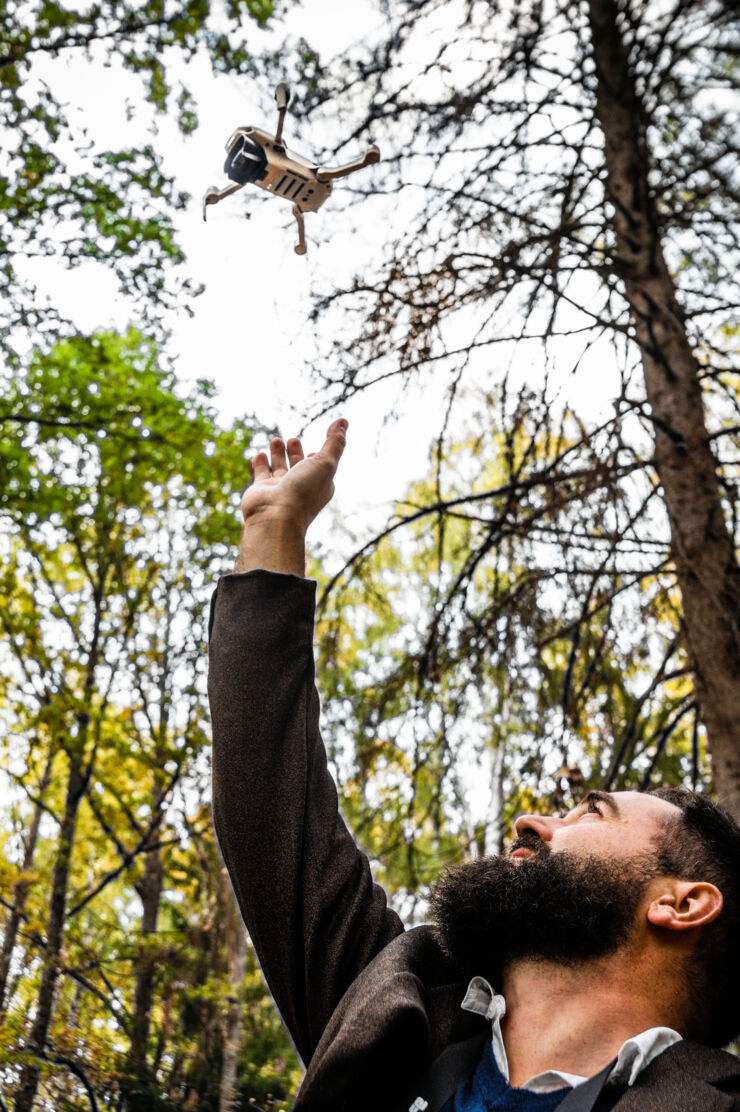 Picture of alumnus saving the forets.