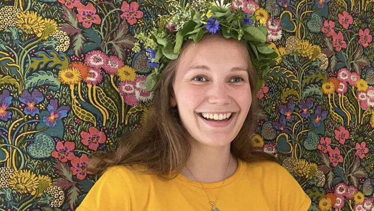 Portrait of young woman wearing a flower wreath