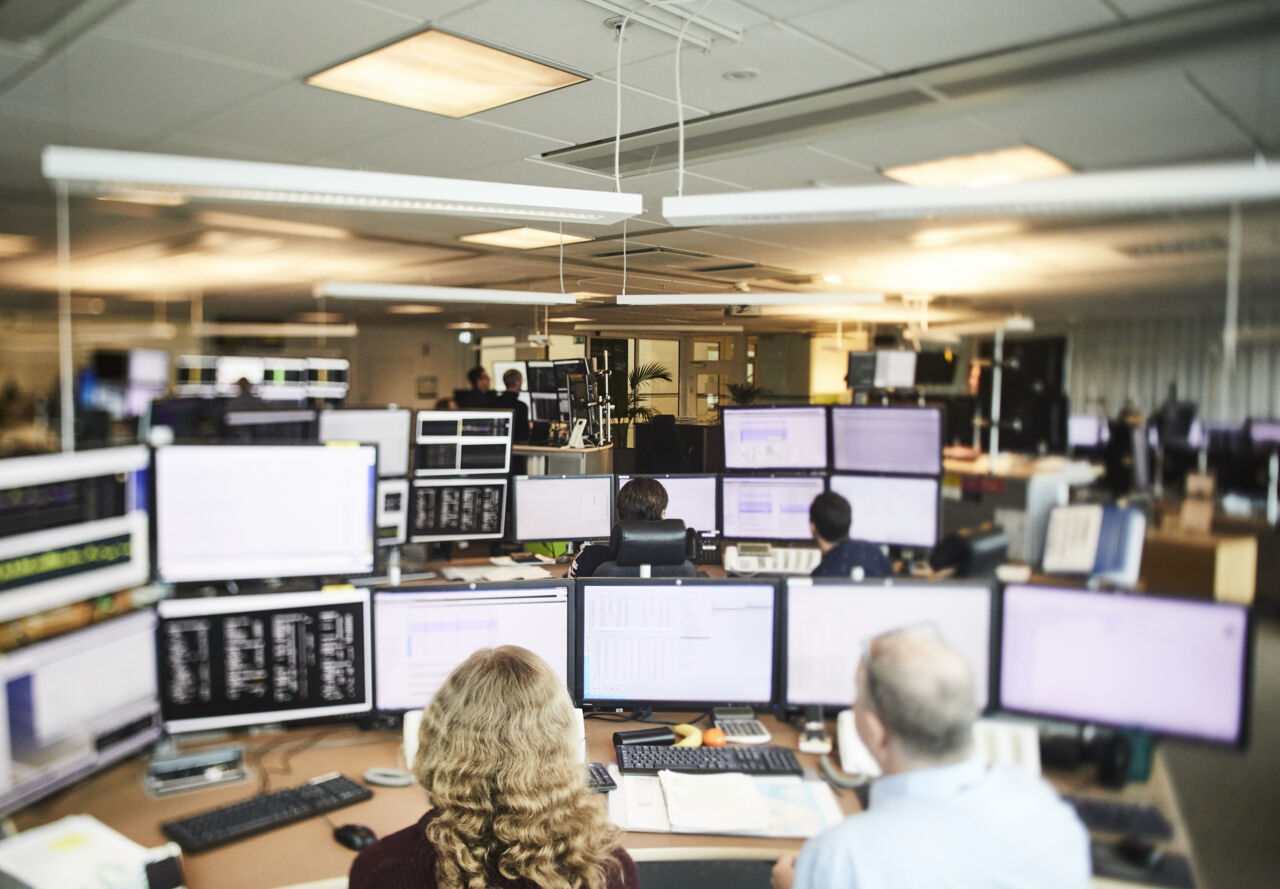 A room with many computer screens, Control room. 