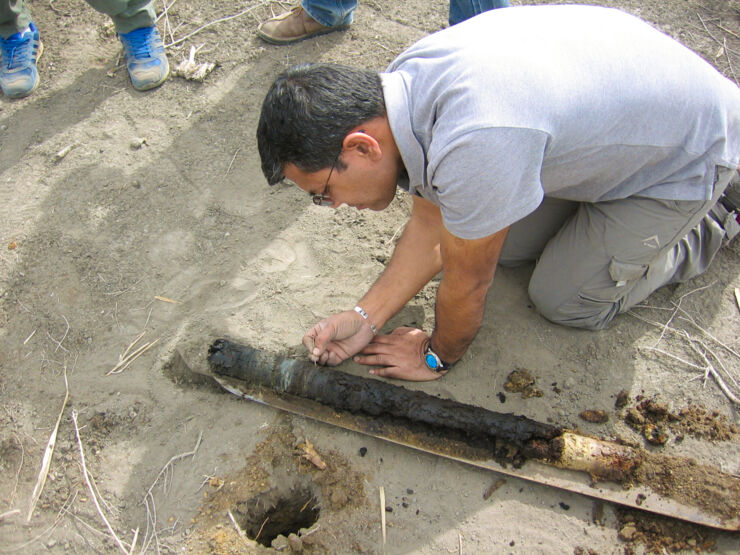 Researcher at a archeological excavation site.