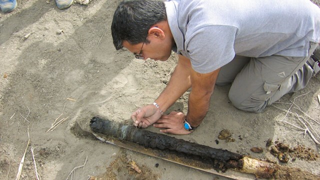 Researcher at a archeological excavation site.