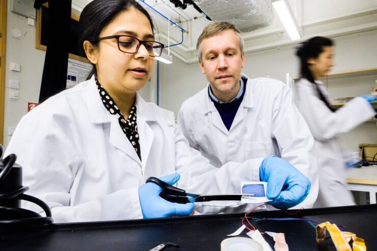 Researchers in a lab.