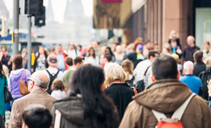 Pavement full of people.