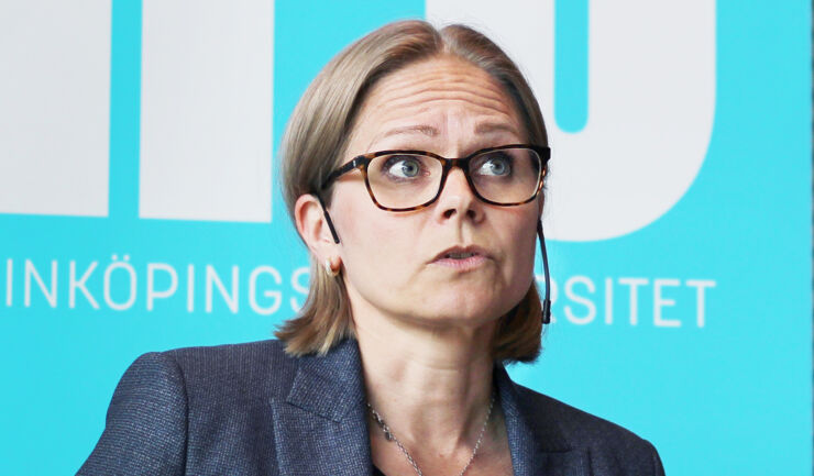 female scientist, speaking.