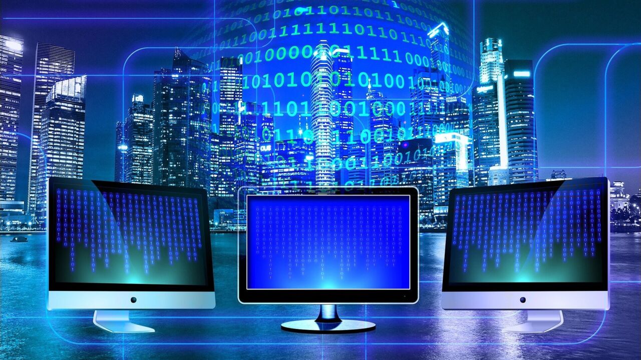 Three computer screens.