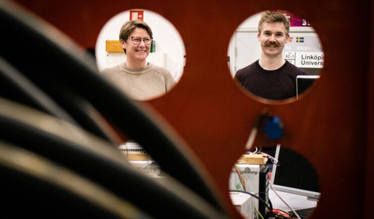 Two scientists in the hydraulic lab.