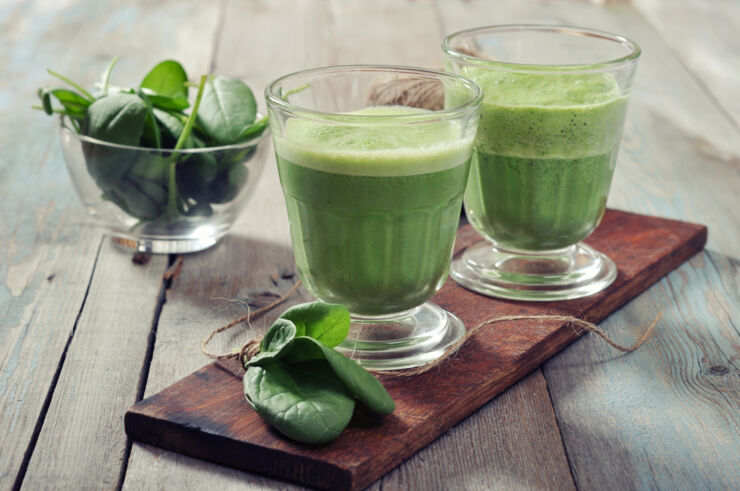 smoothie and spinach leaves.