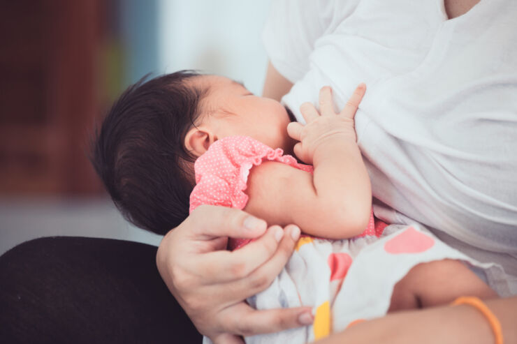 mother breastfeeding her baby.