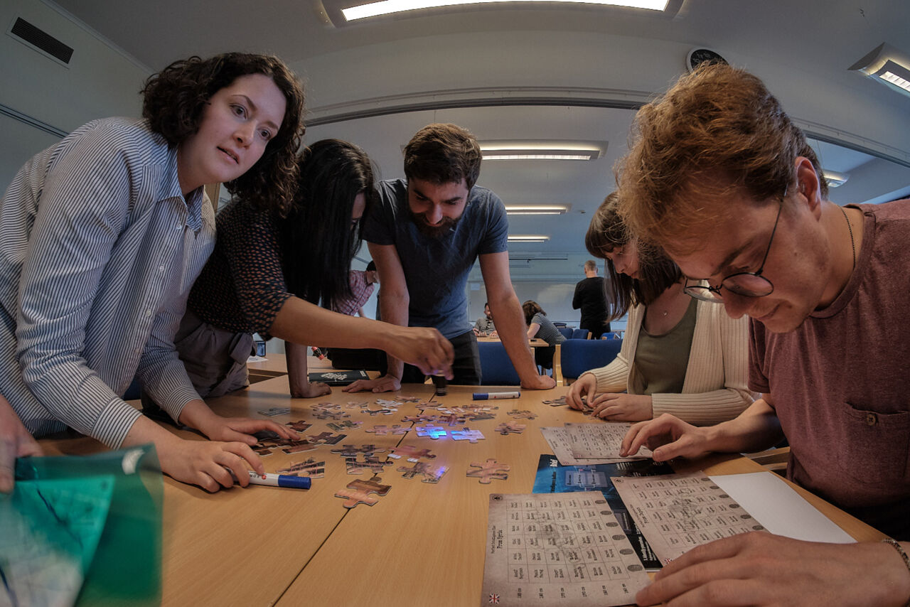 A group of participants having an indoor activity.