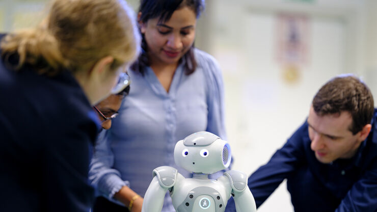 Small service robot together with a few persons