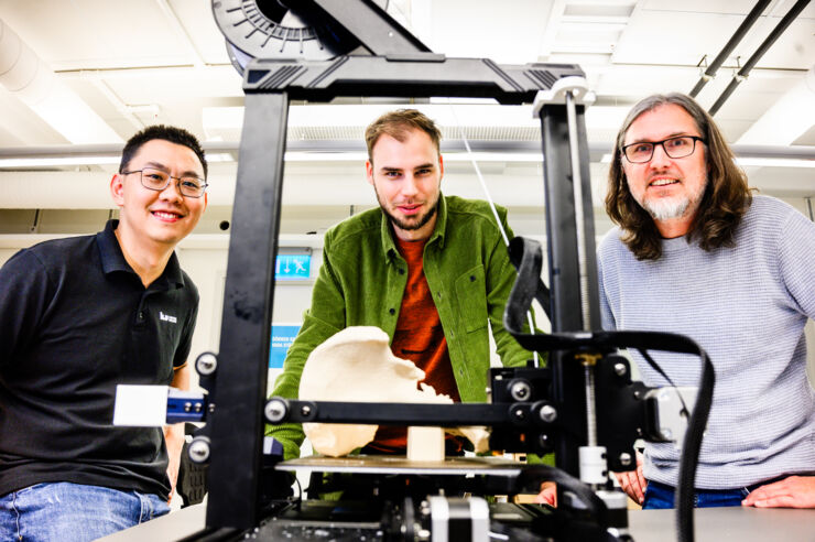 Three male scientist in laboratory