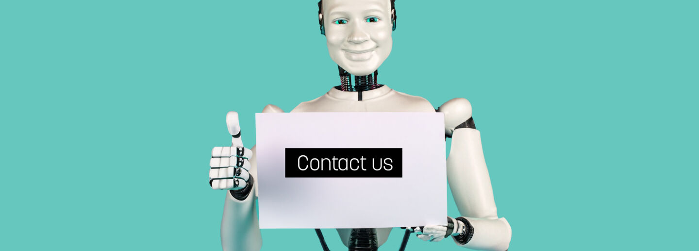Friendly robot gives thumb up and shows a paper with the words Contact us.