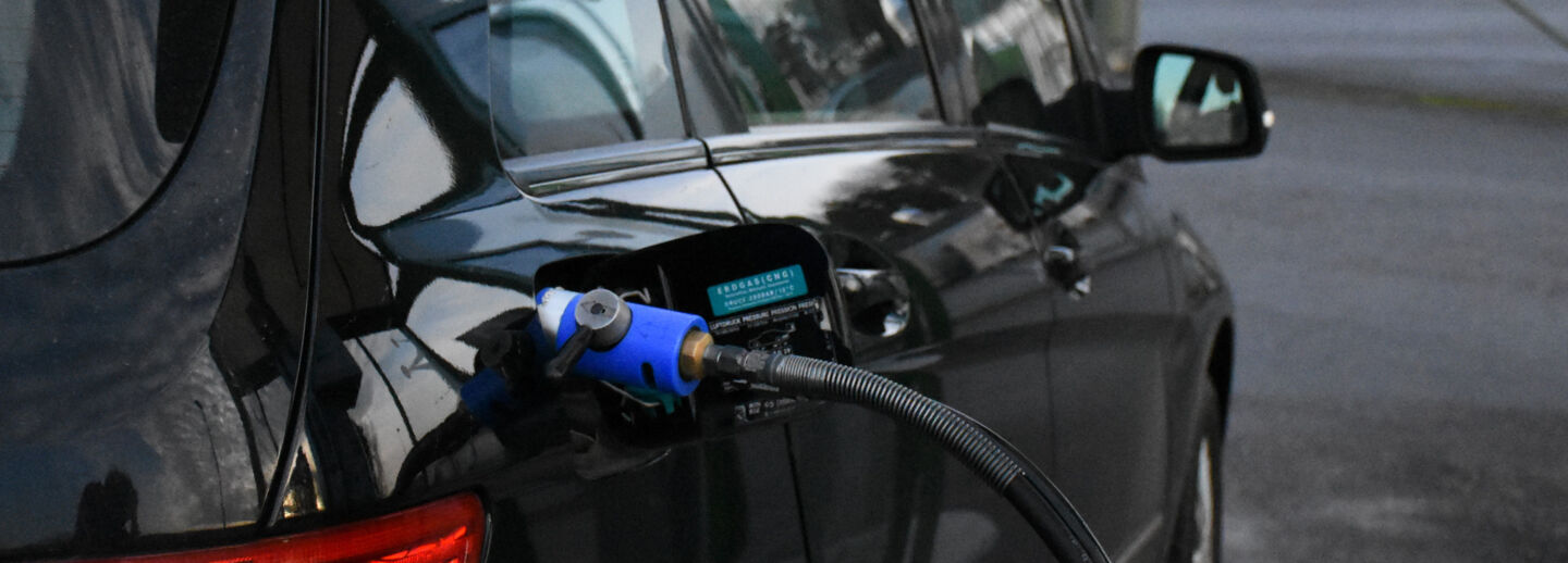 Biogas fueled car at the fueling station. 