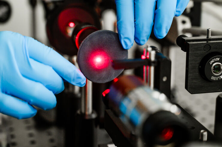 Laser shines on black aerogel.