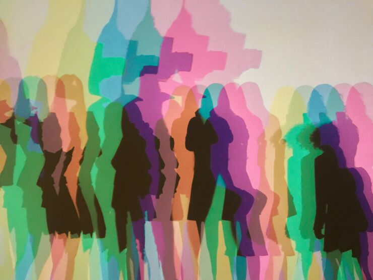 People in silhouette in different bright colours