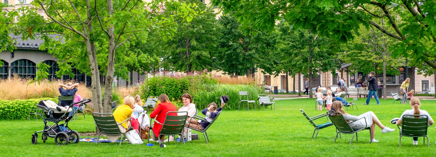 People resting in urban park.