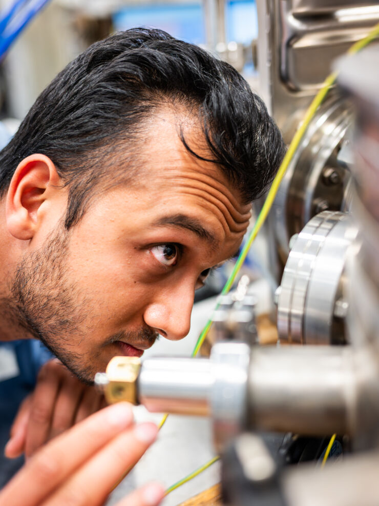 Person looking at lab grear.