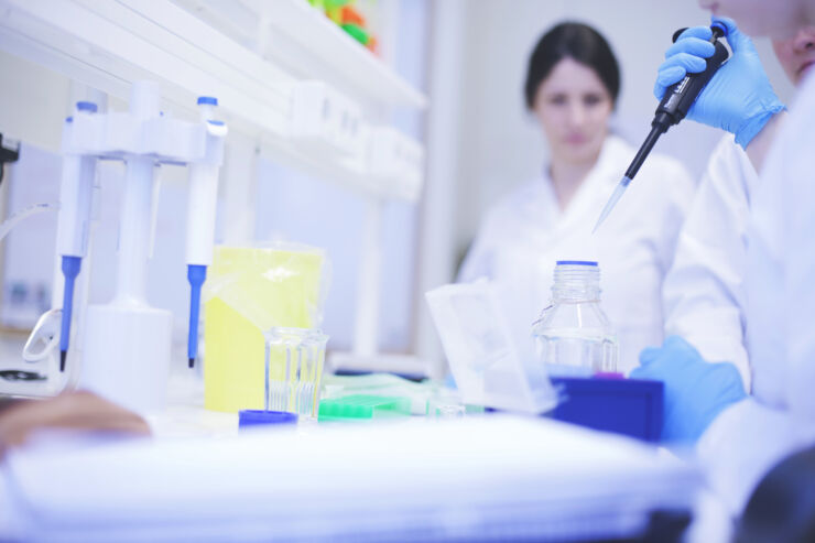 Two people in a medical laboratory.