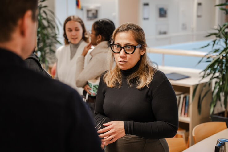 A student is talking to a teacher