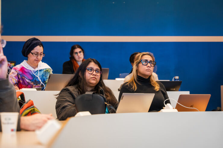 The students are listening during the lecture.